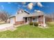 Charming two-story home with well-manicured lawn and beautifully landscaped yard and covered porch at 628 Southridge Ct, Westfield, IN 46074