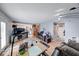 Inviting living room showcasing hardwood floors, comfortable seating, and a decorative entertainment center at 628 Southridge Ct, Westfield, IN 46074