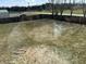 Spacious backyard with mature trees and a fence for privacy, perfect for outdoor activities and relaxation at 6417 E Clarks Hill Ct, Camby, IN 46113