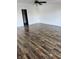 Bedroom featuring hard wood flooring, fresh paint and modern ceiling fan at 6417 E Clarks Hill Ct, Camby, IN 46113