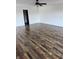 Bedroom featuring hard wood flooring, fresh paint and modern ceiling fan at 6417 E Clarks Hill Ct, Camby, IN 46113