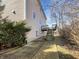 Backyard featuring a wood deck with stairs leading to a concrete patio area at 643 Bracknell Dr, Avon, IN 46123