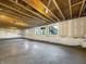 Spacious basement with exposed ceiling rafters, several windows, and wall insulation at 643 Bracknell Dr, Avon, IN 46123