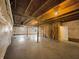 A large basement space ready for customization with exposed rafters and insulation at 643 Bracknell Dr, Avon, IN 46123