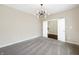Bedroom space with neutral paint and carpet, featuring a view of a bonus area and natural light at 643 Bracknell Dr, Avon, IN 46123