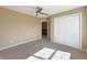 Bedroom with ceiling fan and closet, offering ample storage and comfort at 643 Bracknell Dr, Avon, IN 46123