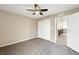 Bedroom featuring a ceiling fan, closet, and neutral walls, offering a cozy space at 643 Bracknell Dr, Avon, IN 46123