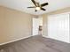 Neutral bedroom with ceiling fan and closet, providing comfort and storage at 643 Bracknell Dr, Avon, IN 46123