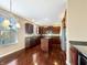 Modern kitchen features dark wood cabinets, stainless steel appliances, and a center island at 643 Bracknell Dr, Avon, IN 46123