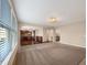 Bright living room with large windows, neutral decor, and an open concept layout at 643 Bracknell Dr, Avon, IN 46123