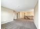 Spacious loft area with neutral carpeting and multiple doorways at 643 Bracknell Dr, Avon, IN 46123