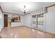 Bright dining area showcasing wood floors and sliding glass doors to the outside patio at 6602 Boston Ridge Ct, Indianapolis, IN 46237