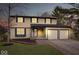 Charming two-story home featuring a two-car garage, neutral siding and complemented by a well-manicured lawn at 6602 Boston Ridge Ct, Indianapolis, IN 46237