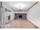 Spacious living room with a charming brick fireplace and sliding glass doors to a deck at 6602 Boston Ridge Ct, Indianapolis, IN 46237
