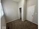 Neutral bedroom with carpeted floors and a large window at 709 S Vine St, Muncie, IN 47302