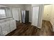 Beautiful kitchen with white cabinetry, attractive countertops, and modern stainless steel refrigerator at 709 S Vine St, Muncie, IN 47302