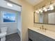 Bathroom featuring modern vanity and natural light at 7224 Rose Dr, Indianapolis, IN 46227