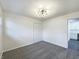 Bedroom showcasing carpet flooring, closet, and natural light at 7224 Rose Dr, Indianapolis, IN 46227