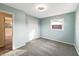 Bedroom featuring light-blue walls, closet, carpet and natural light at 7224 Rose Dr, Indianapolis, IN 46227