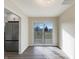 Bright dining area with sliding glass doors leading to the backyard at 7224 Rose Dr, Indianapolis, IN 46227