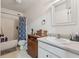 Bathroom features a shower, vanity, and toilet at 76 Wyndham Ln, Brownsburg, IN 46112