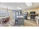 Well-lit kitchen with modern appliances, a central island, and a cozy breakfast nook at 76 Wyndham Ln, Brownsburg, IN 46112