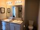 Bright bathroom features double sink vanity with large mirror and modern lighting at 7835 E 296Th St, Atlanta, IN 46031