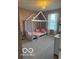 Stylish bedroom featuring a house-shaped bed frame and a soft, light-colored carpet at 7835 E 296Th St, Atlanta, IN 46031