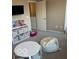 A playful playroom featuring a television, storage unit and a cozy beanbag chair at 7835 E 296Th St, Atlanta, IN 46031
