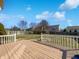 Large wooden deck offers space for outdoor entertaining with a view of the backyard at 851 Pine Lake Dr, Greenwood, IN 46143