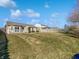 Expansive backyard with a well-maintained lawn and privacy fencing at 851 Pine Lake Dr, Greenwood, IN 46143