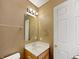 Bathroom featuring a sink vanity, neutral paint, and a framed mirror above the sink at 851 Pine Lake Dr, Greenwood, IN 46143