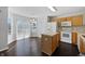 Eat-in kitchen featuring a center island, tile backsplash, and stainless steel appliances at 851 Pine Lake Dr, Greenwood, IN 46143
