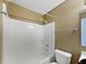 Shower in bathroom with neutral wall, shower head, and grab bars at 851 Pine Lake Dr, Greenwood, IN 46143