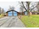 Charming single story home with a large front yard, brick exterior and a two car garage at 9053 Sunset Ln, Brownsburg, IN 46112