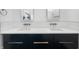 Stylish bathroom with double sink vanity, modern fixtures, and sleek design at 917 Buchanan St, Indianapolis, IN 46203