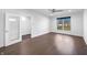 Bright bedroom with modern flooring, white walls, and a ceiling fan at 917 Buchanan St, Indianapolis, IN 46203