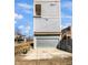 Three-story home with a large garage and private balconies at 917 Buchanan St, Indianapolis, IN 46203