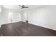 Bright main bedroom with hardwood floors and ensuite bathroom entrance at 917 Buchanan St, Indianapolis, IN 46203