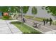 Outdoor common area featuring tables, chairs, and recreational games for relaxing and socializing at 9184 Anthem Ave, Plainfield, IN 46168