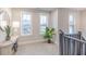 Cozy loft area with lots of natural light, decor, and a view to the outside at 9184 Anthem Ave, Plainfield, IN 46168