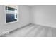 This bedroom features carpeted floors and a window for natural light at 9198 Anthem Ave, Plainfield, IN 46168