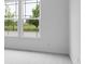 A bright bedroom with light carpet and large windows offering ample natural light at 9198 Anthem Ave, Plainfield, IN 46168