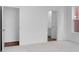 Spacious bedroom with neutral carpet, two closets, and a view to the bathroom at 9198 Anthem Ave, Plainfield, IN 46168