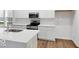 Modern kitchen with white cabinets, stainless steel appliances, and granite countertops at 9198 Anthem Ave, Plainfield, IN 46168