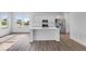 Modern kitchen features stainless steel appliances, white cabinets and quartz countertops at 9198 Anthem Ave, Plainfield, IN 46168