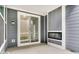 This patio features a fireplace and sliding glass doors at 9198 Anthem Ave, Plainfield, IN 46168