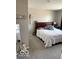 Simple bedroom with a comfortable bed, neutral decor, and soft natural light at 943 Rushmore Dr, Pittsboro, IN 46167