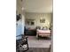 Cozy bedroom featuring a comfortable bed, decorative mirror, and a neutral color scheme at 943 Rushmore Dr, Pittsboro, IN 46167