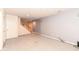 Basement featuring carpet flooring and stairs to the main level at 10580 Saddlestone Dr, Fishers, IN 46040